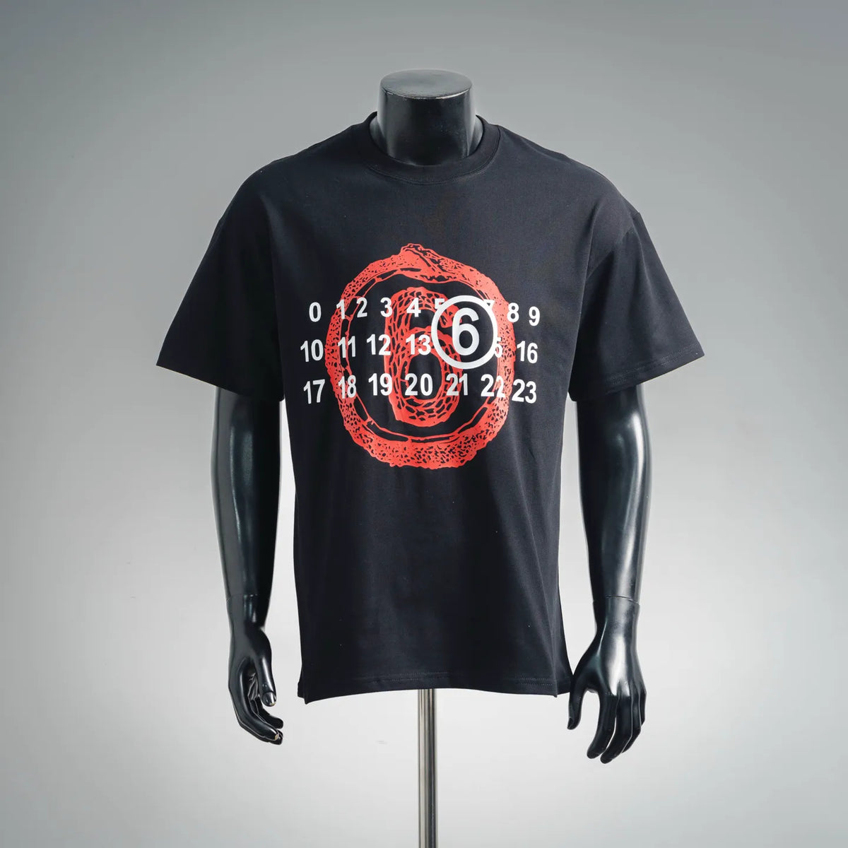 Black short-sleeve T-shirt with red and white circular graphic print