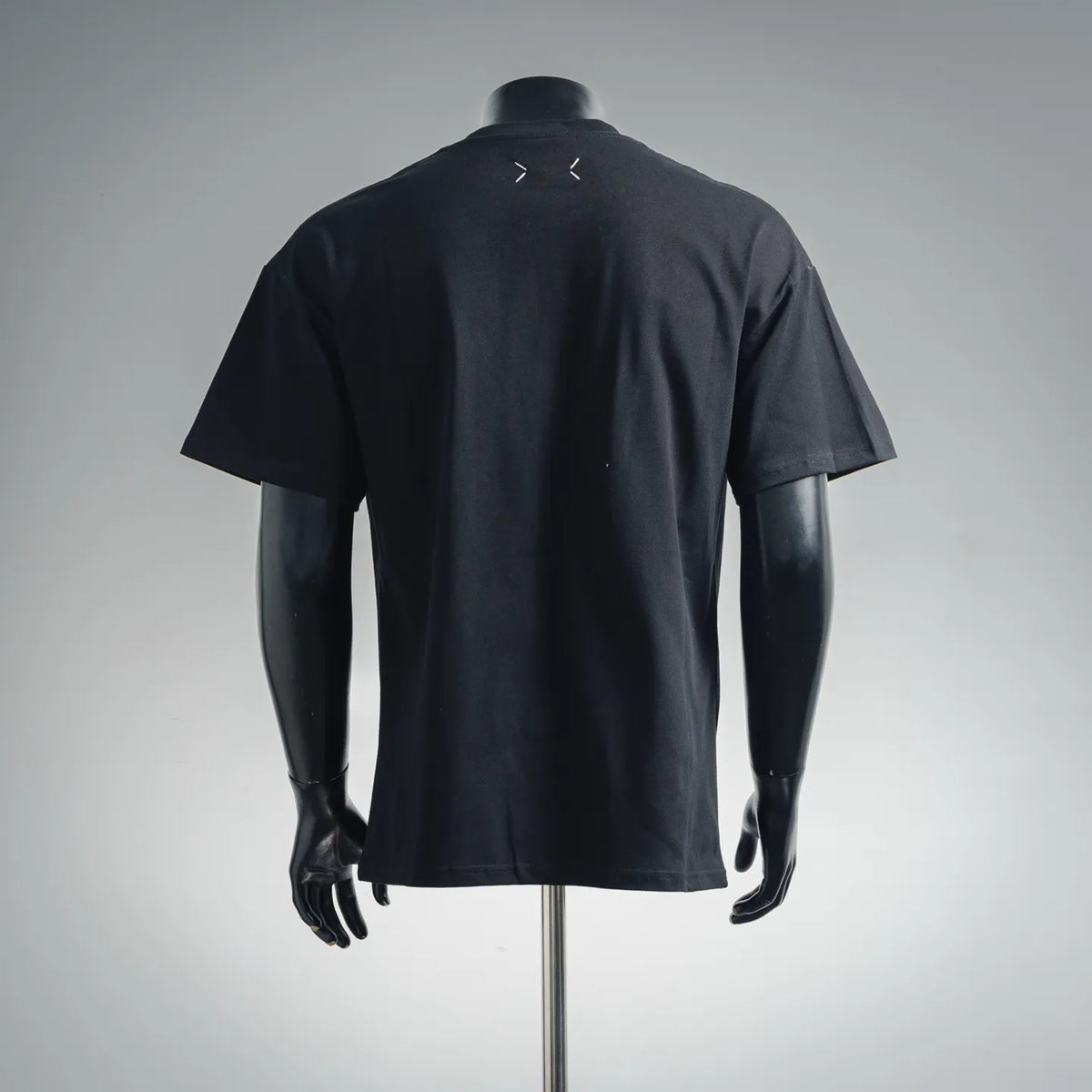 Black short-sleeve T-shirt, plain back with small white logo details