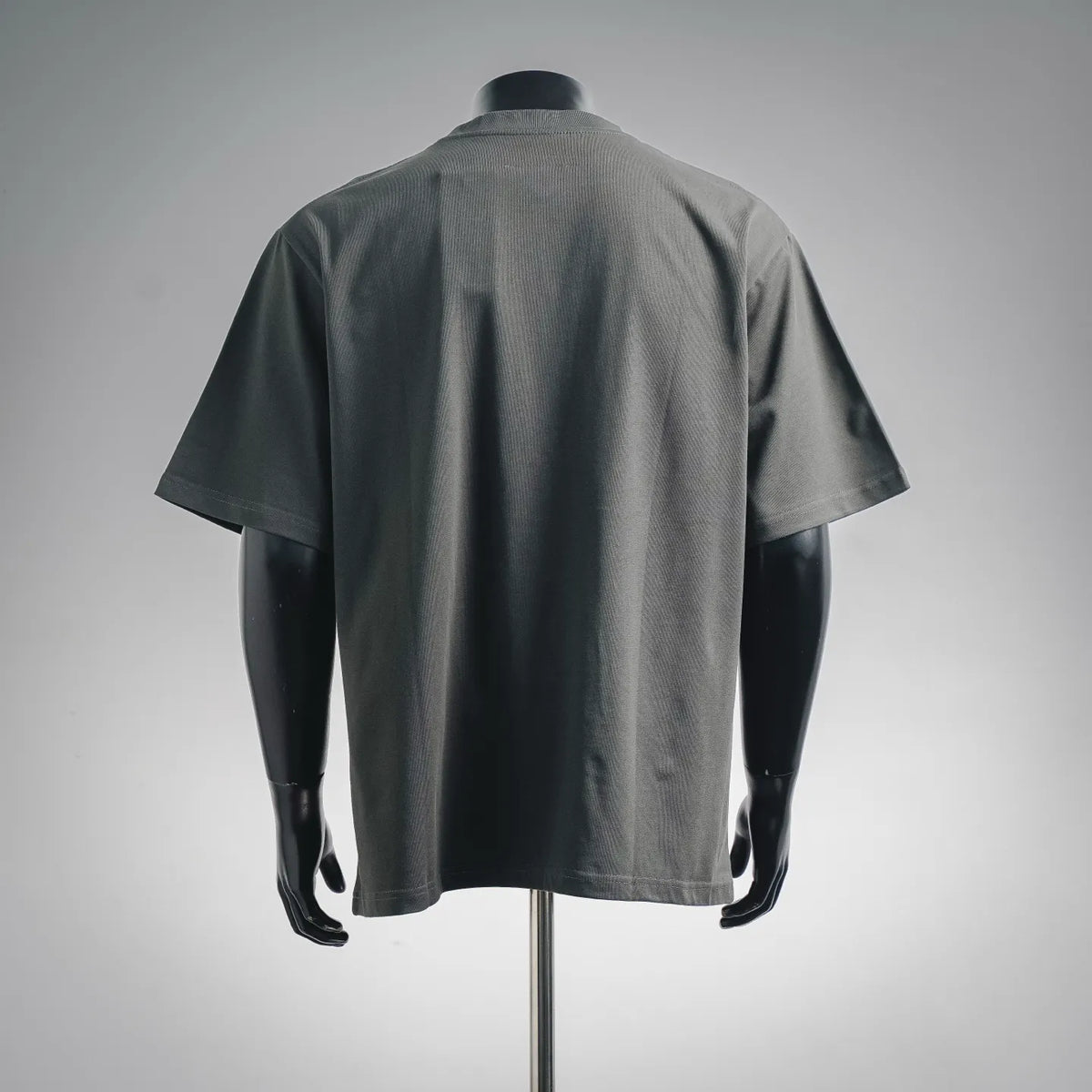 Dark gray crew-neck T-shirt on back view, plain with short sleeves