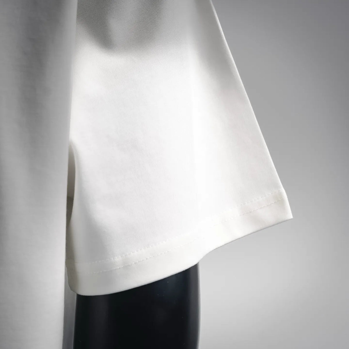 Maison Margiela white short-sleeve T-shirt side with clean stitched hem