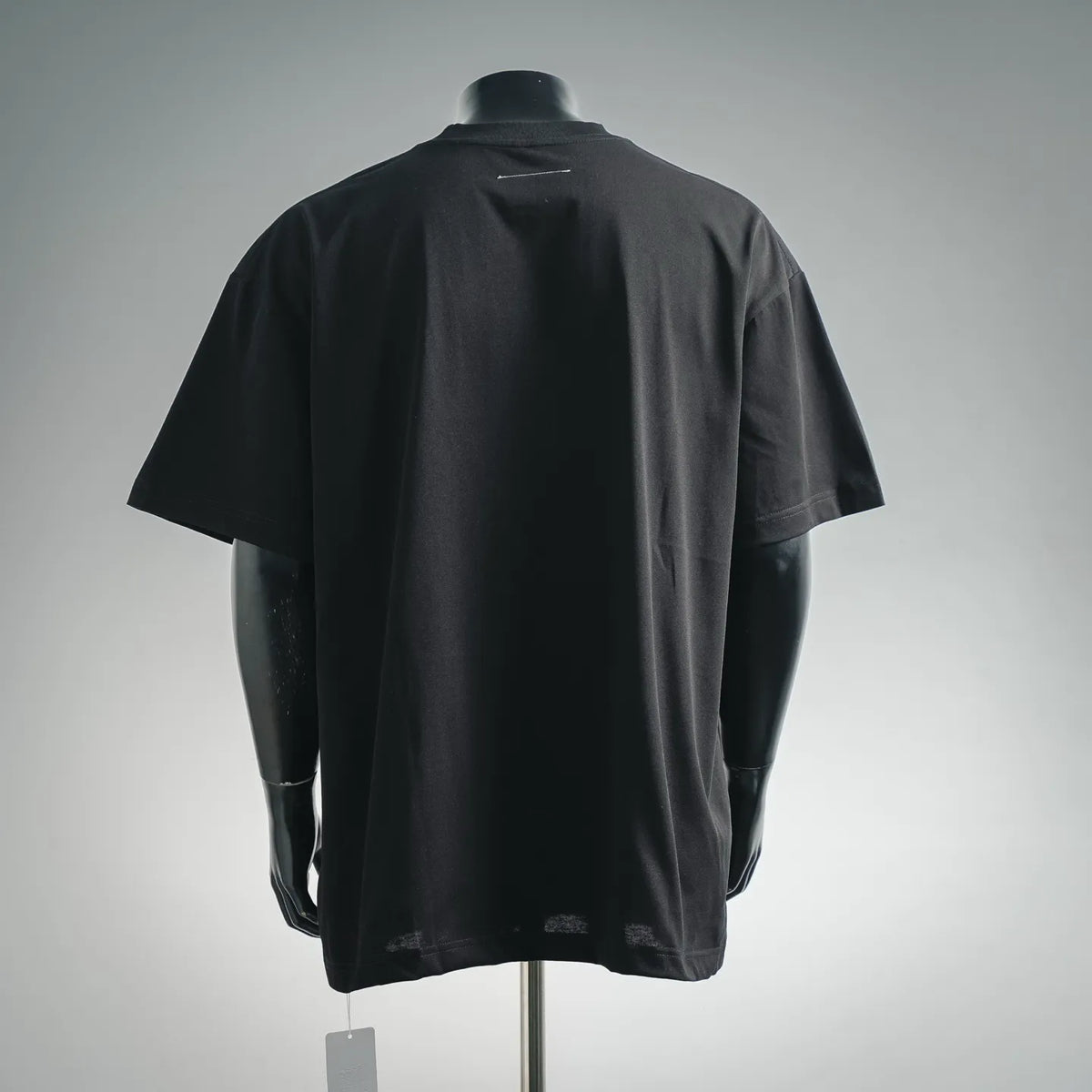 Black short-sleeve crewneck T-shirt on mannequin, back view