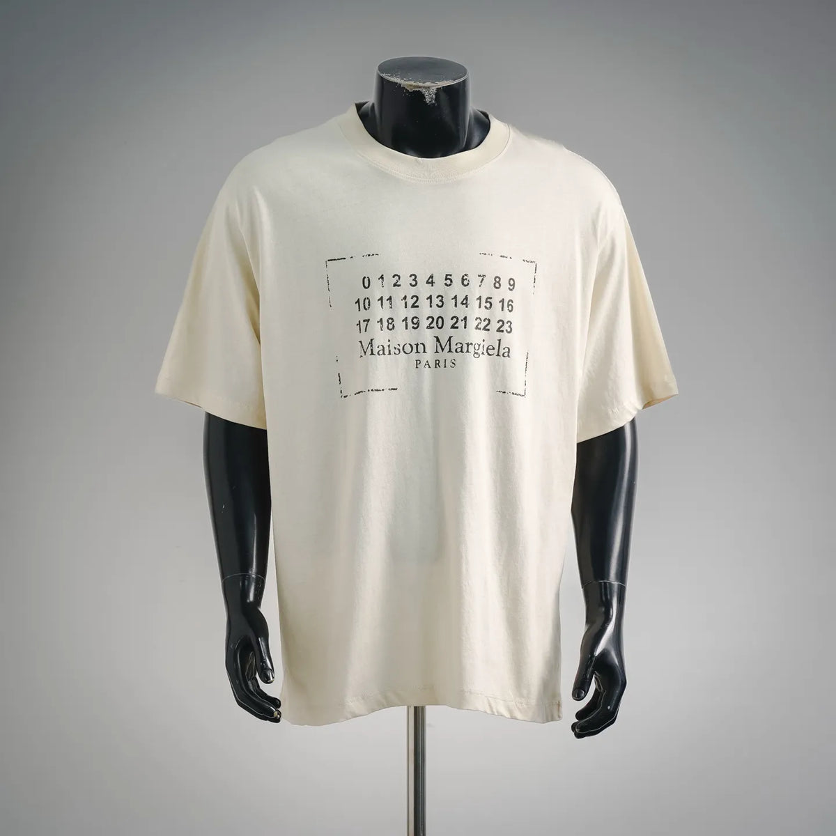 Off-white short-sleeve T-shirt with Maison Margiela number graphic on chest