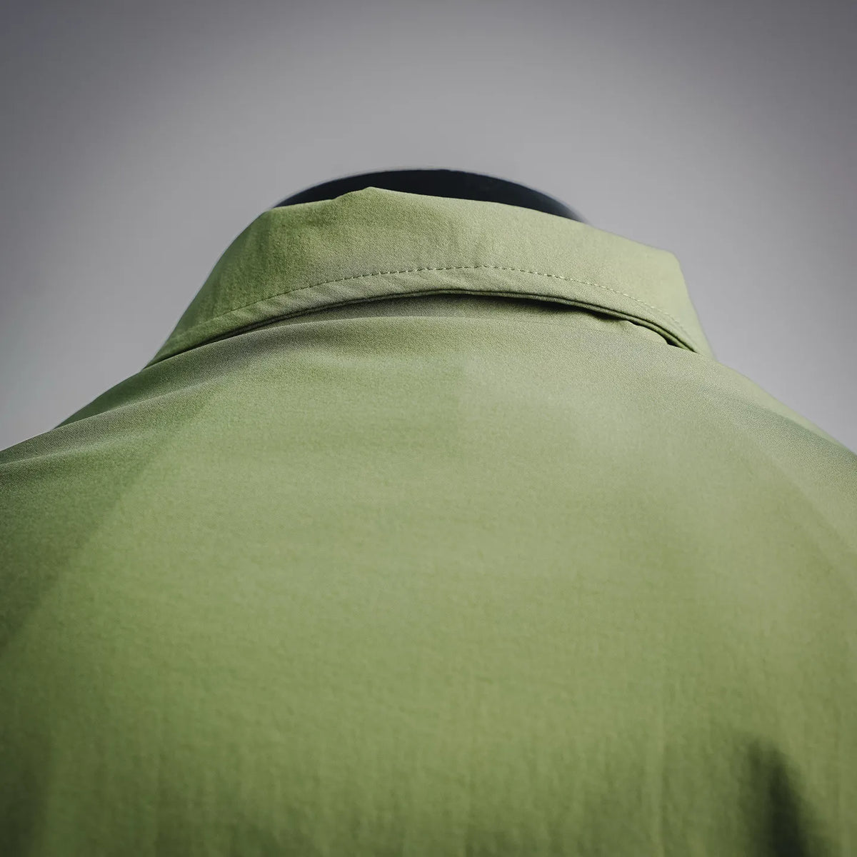 Moncler long green jacket collar with hood seam detail