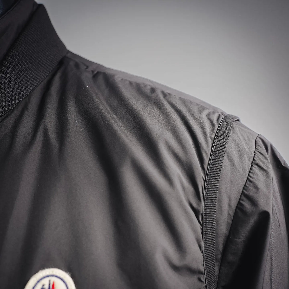 Moncler coat shoulder and side seam with ribbed knit cuff