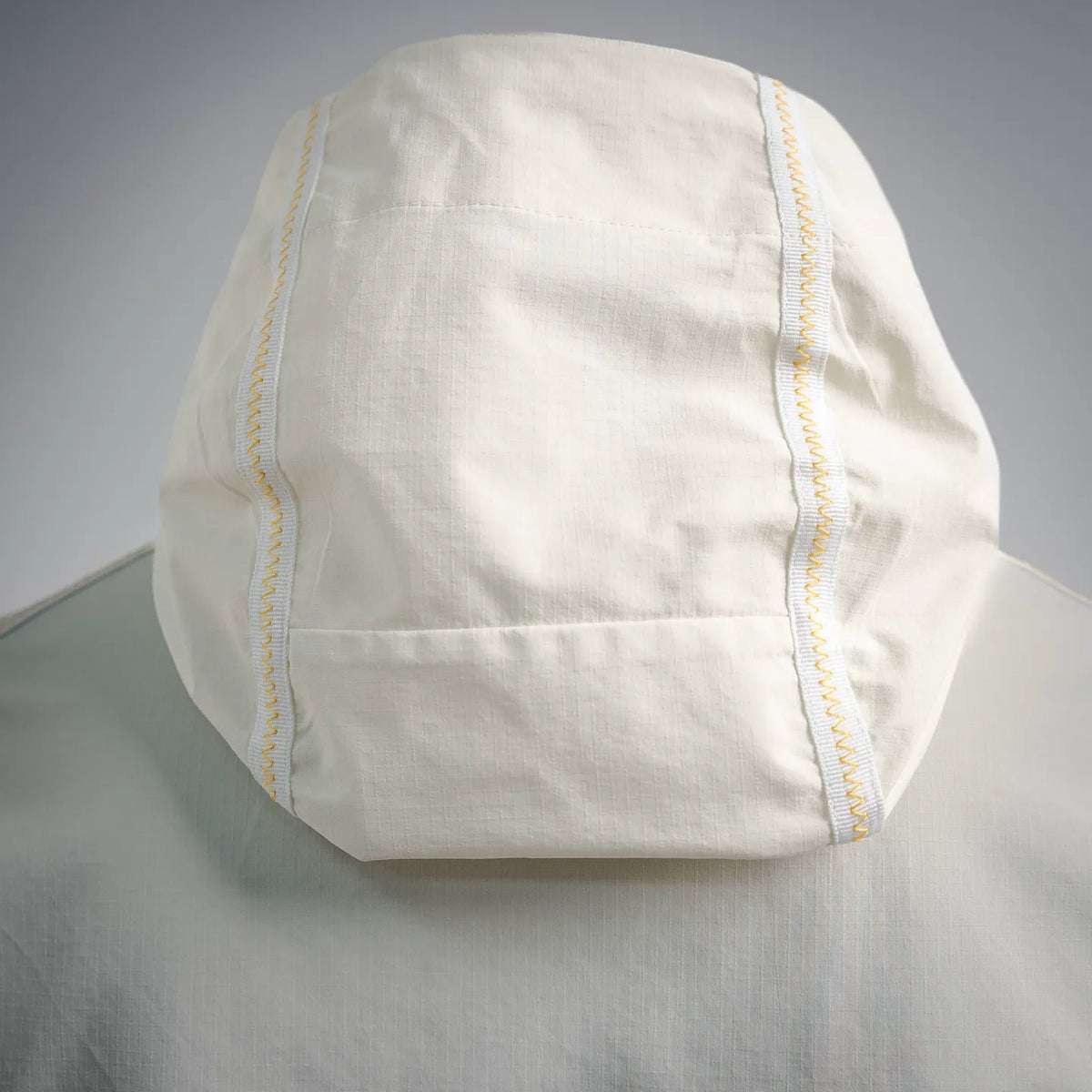 Moncler white hooded coat hood with yellow contrast edge stitching
