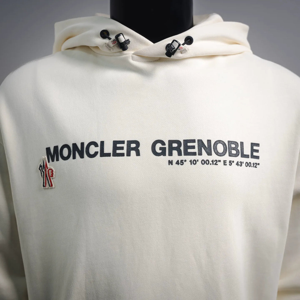 Cream Moncler Grenoble hoodie with chest logo lettering and crest