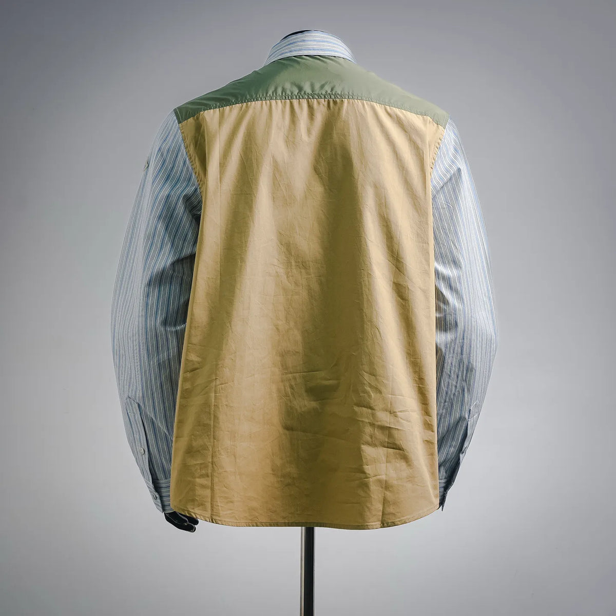 Reversible long-sleeve shirt-jacket with green back panel and blue striped sleeves