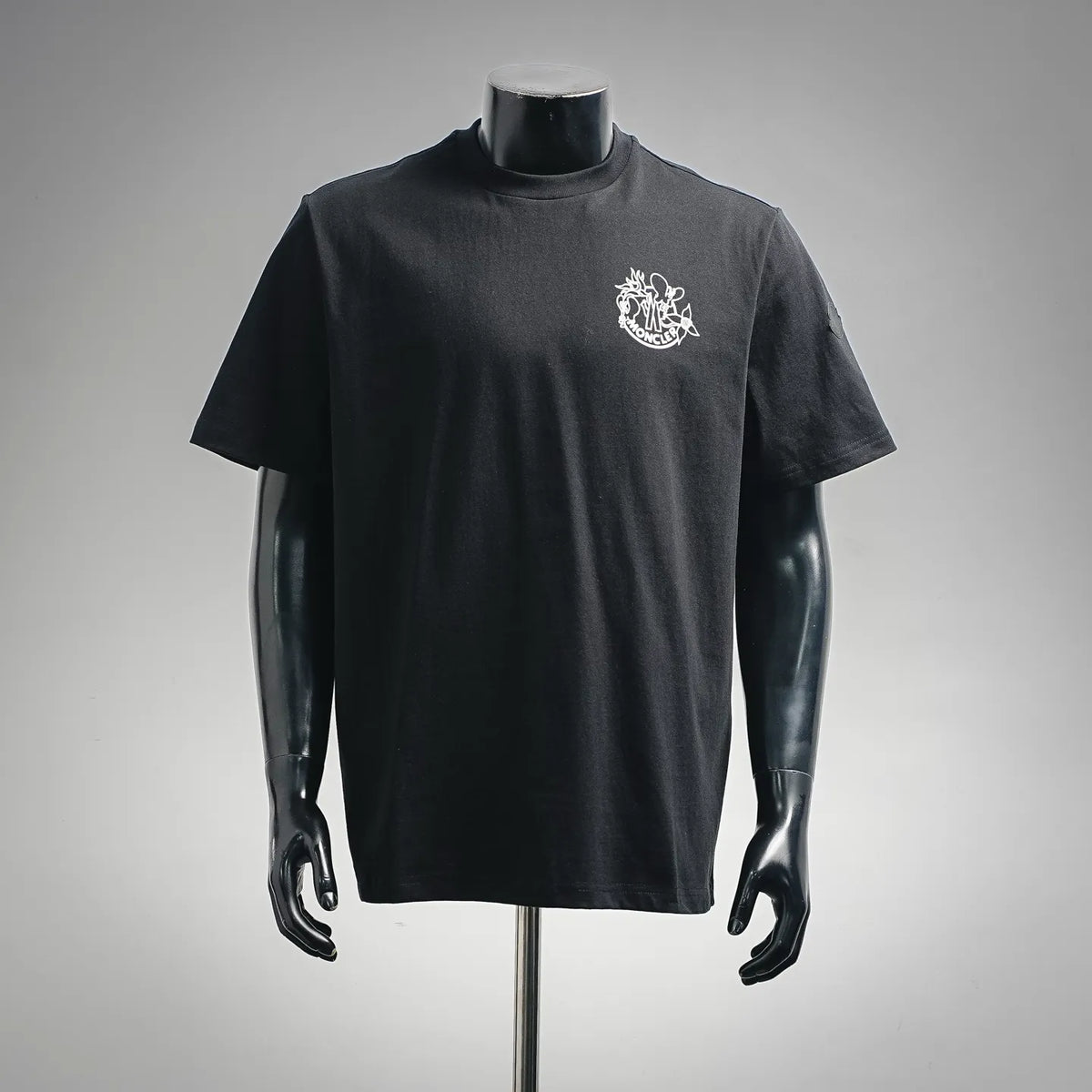 Moncler dark short-sleeve T-shirt with white crest logo at chest