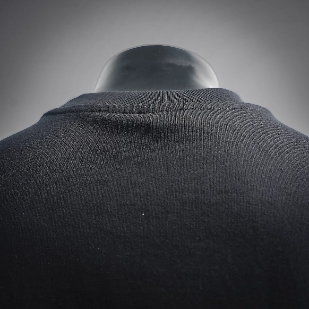 Moncler dark crew-neck T-shirt with ribbed collar close-up
