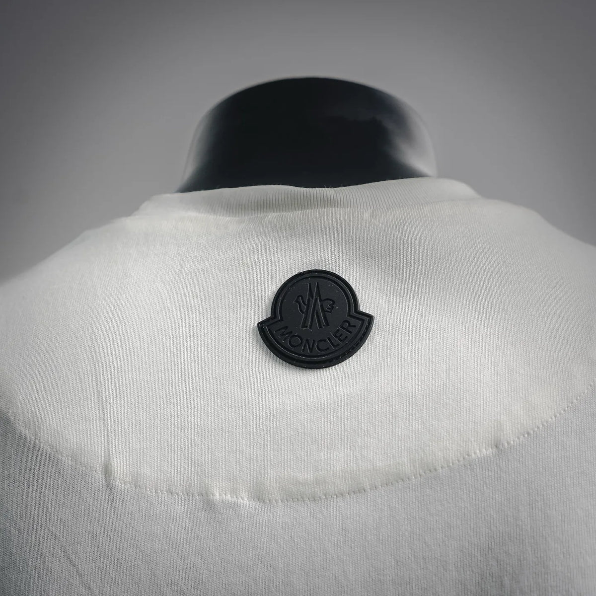 Moncler logo patch at back neckline on white short-sleeve T-shirt