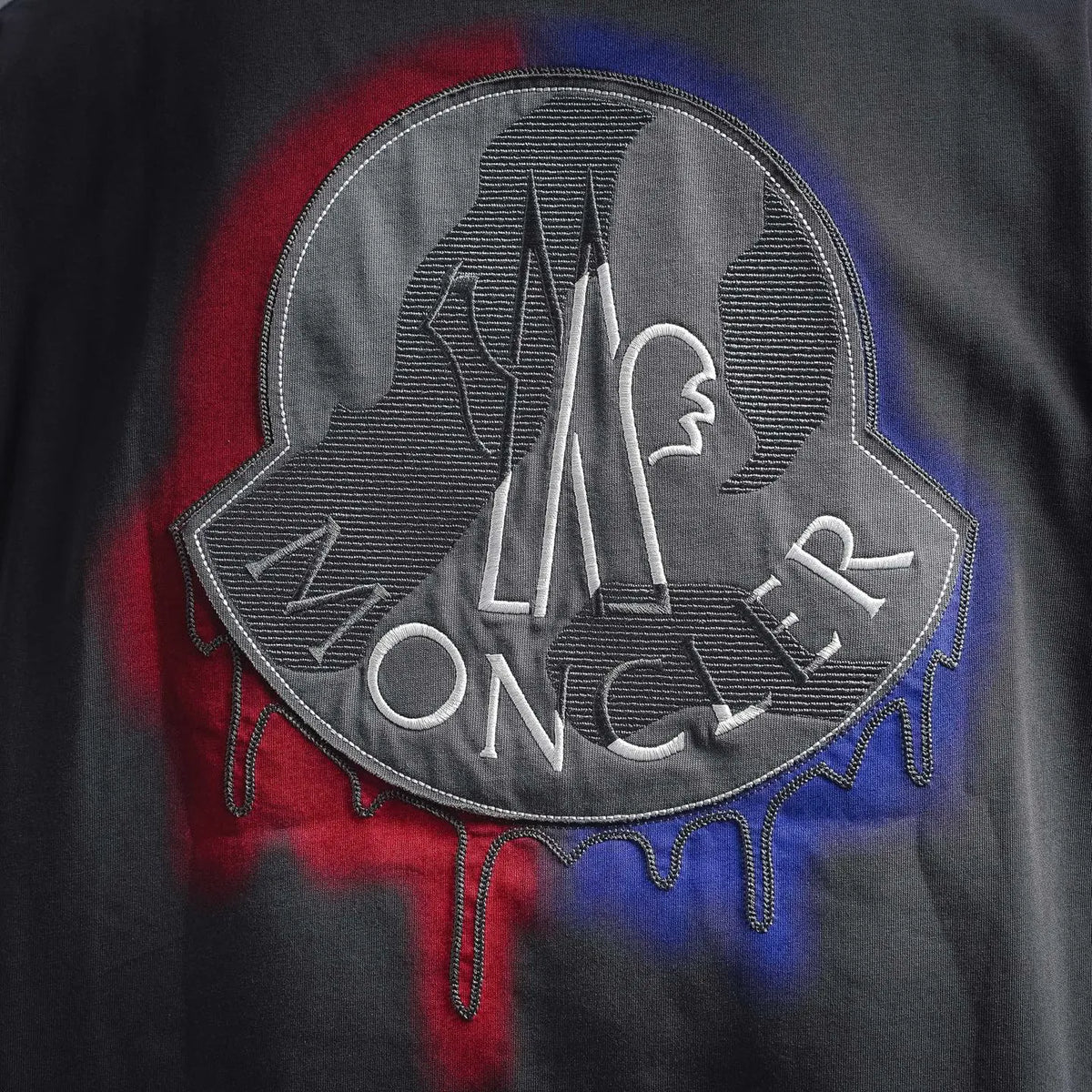 Men's short-sleeve T-shirt close-up, embroidered Moncler back logo patch