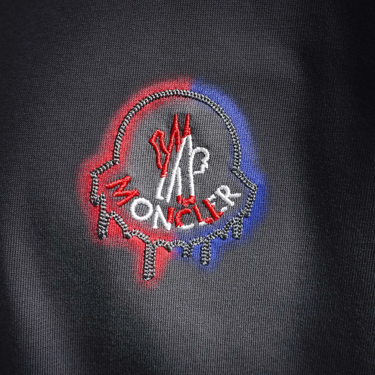 Men's short-sleeve T-shirt close-up, embroidered Moncler front logo patch
