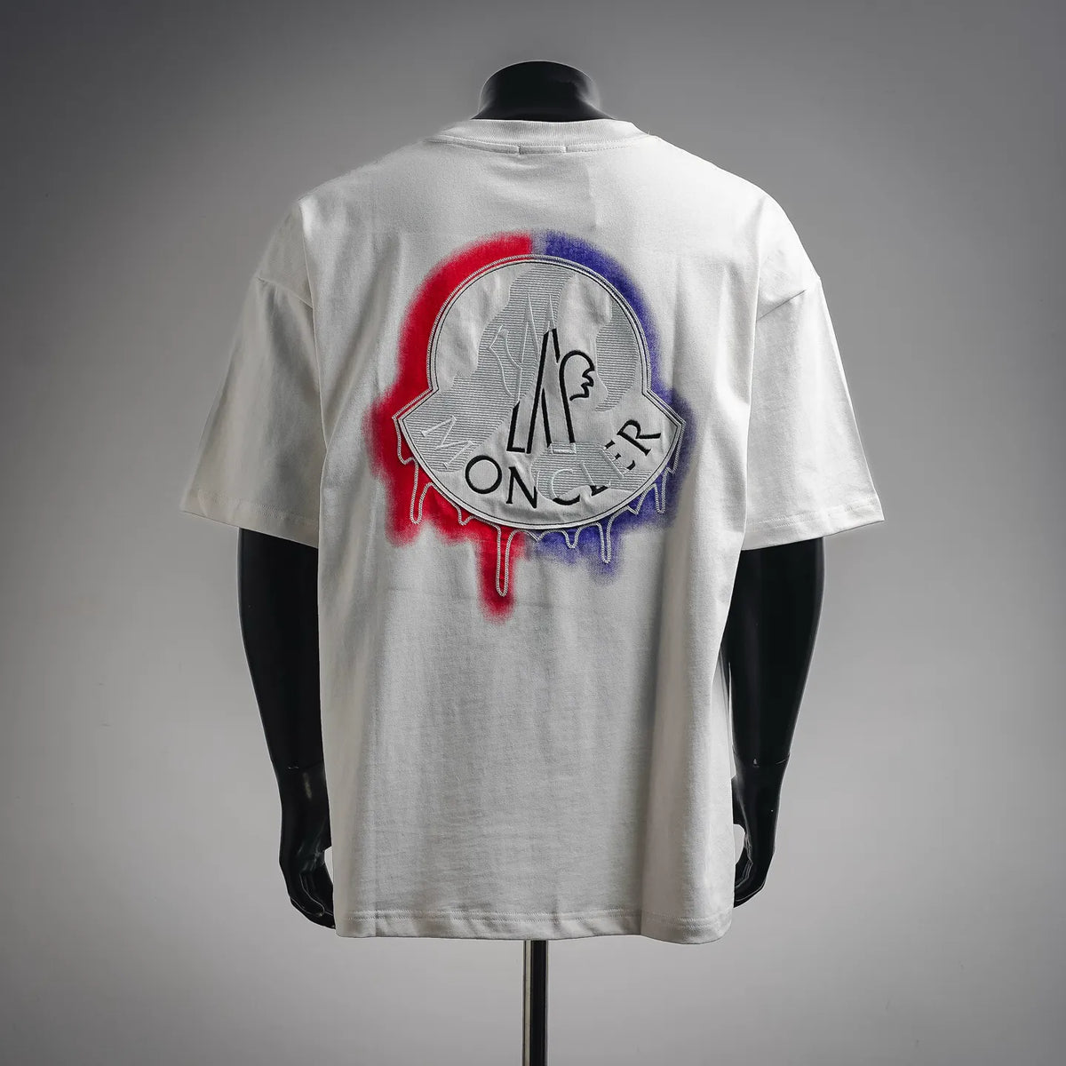 White short-sleeve crewneck T-shirt with large back logo graphic patch