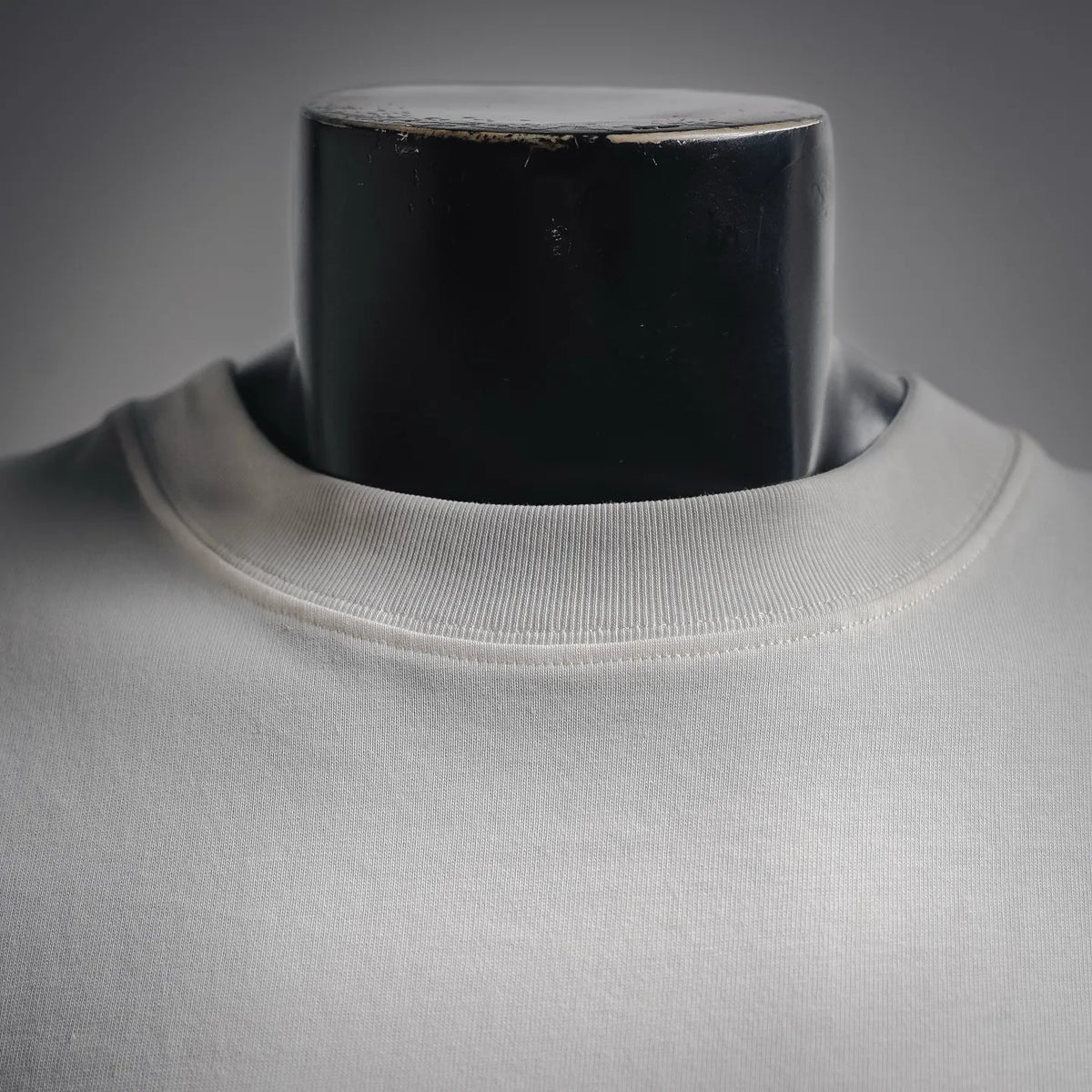 White crewneck T-shirt collar view on a mannequin