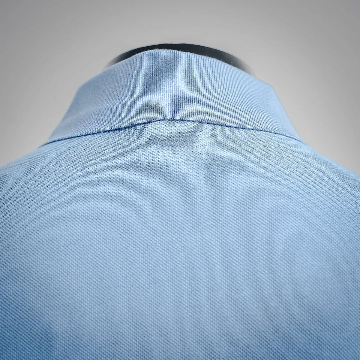 Light blue polo shirt collar and neckline with ribbed trim