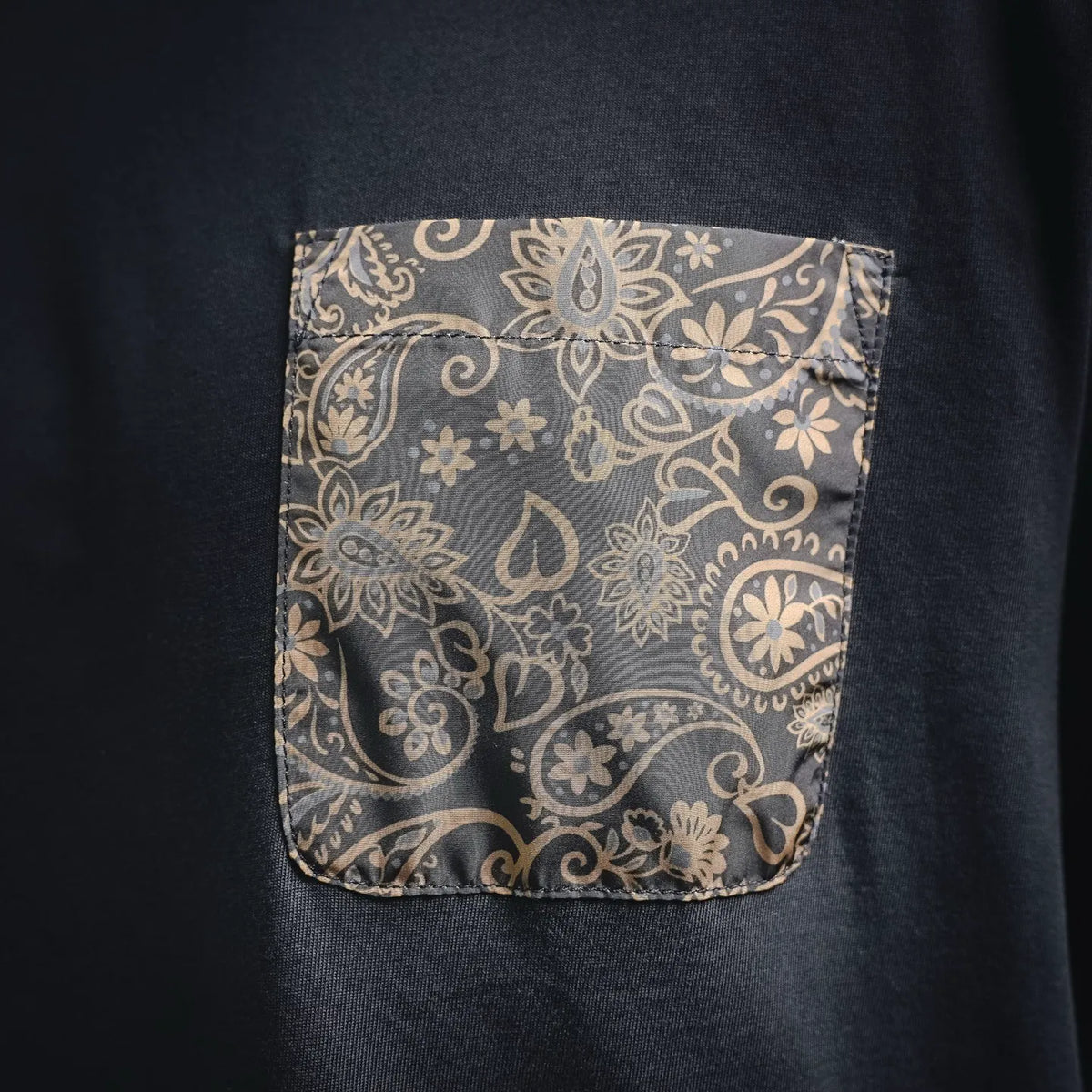 Dark charcoal T-shirt with patterned patch chest pocket
