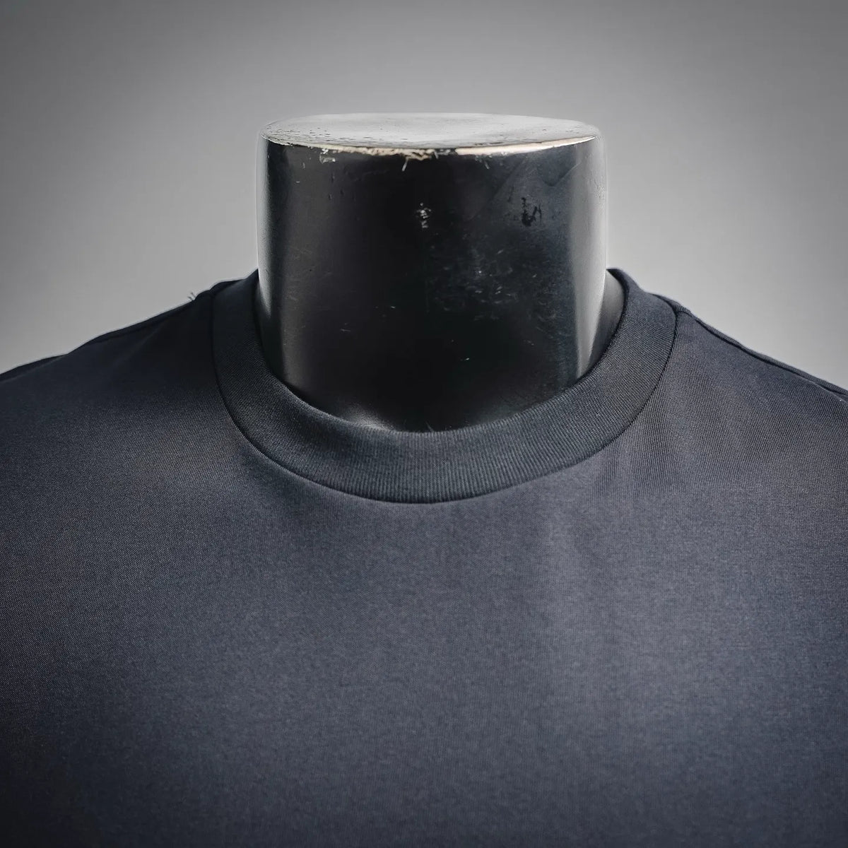 Dark charcoal T-shirt with ribbed crew neck collar