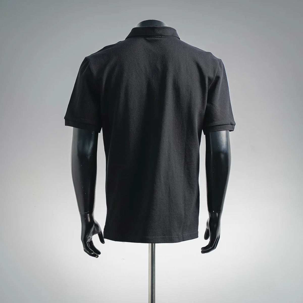 Men's Moncler short-sleeve polo shirt, dark black, plain back view
