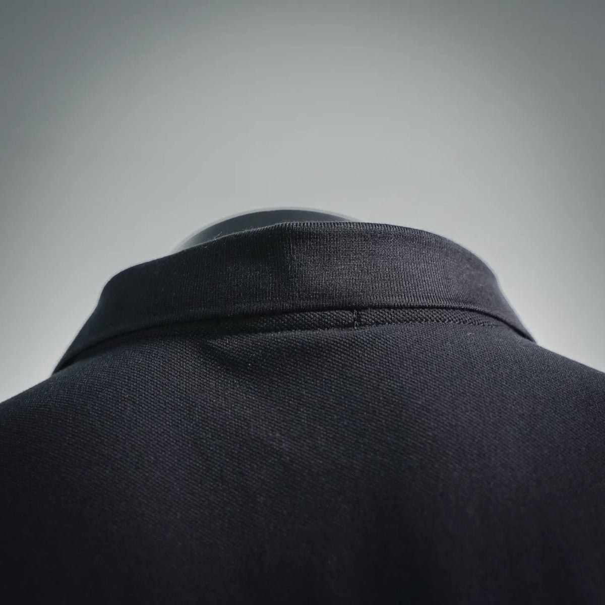 Men's Moncler polo collar and shoulder seam, dark black knit fabric