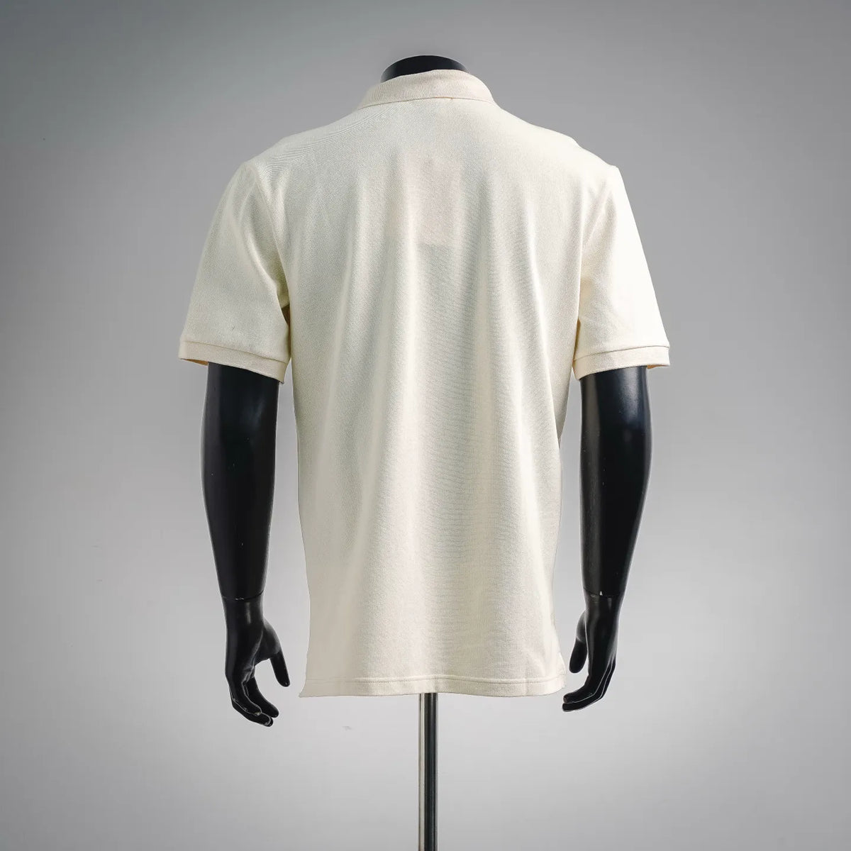 Moncler short-sleeve polo shirt back view, light cream knit with ribbed hem