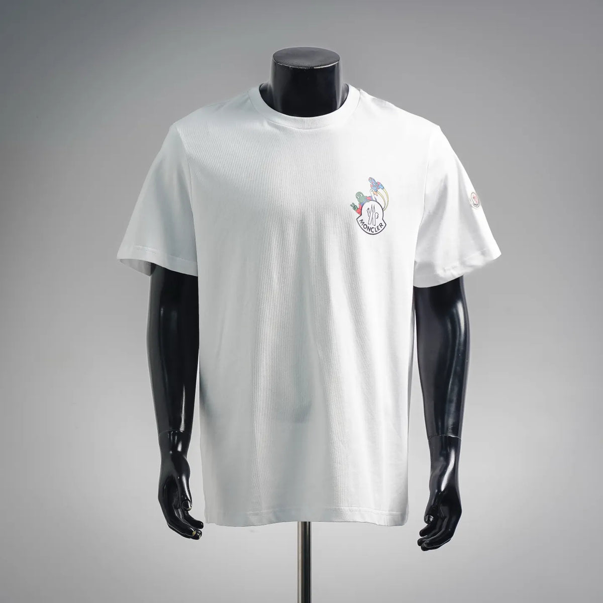 White short-sleeve T-shirt with crew neck and small multicolor Moncler logo graphic