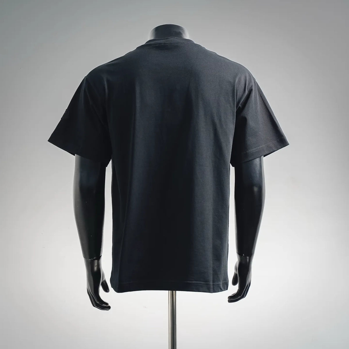 Moncler dark T-shirt back view on mannequin