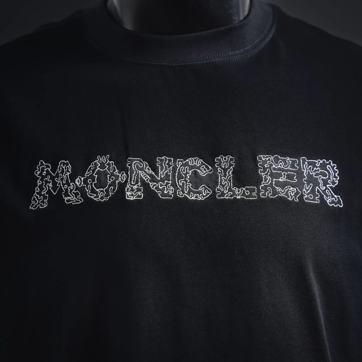 Moncler dark T-shirt crew neck with white outline logo lettering