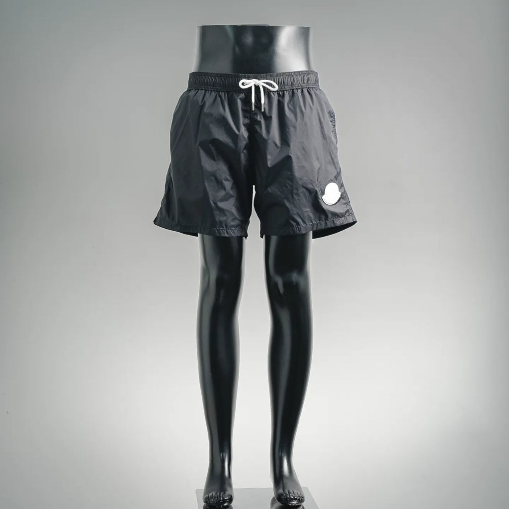 Moncler black swim shorts with elastic waist and drawstring