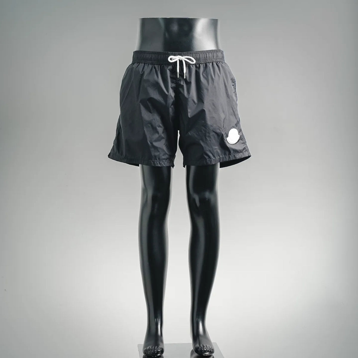 Moncler black swim shorts with elastic waist and drawstring