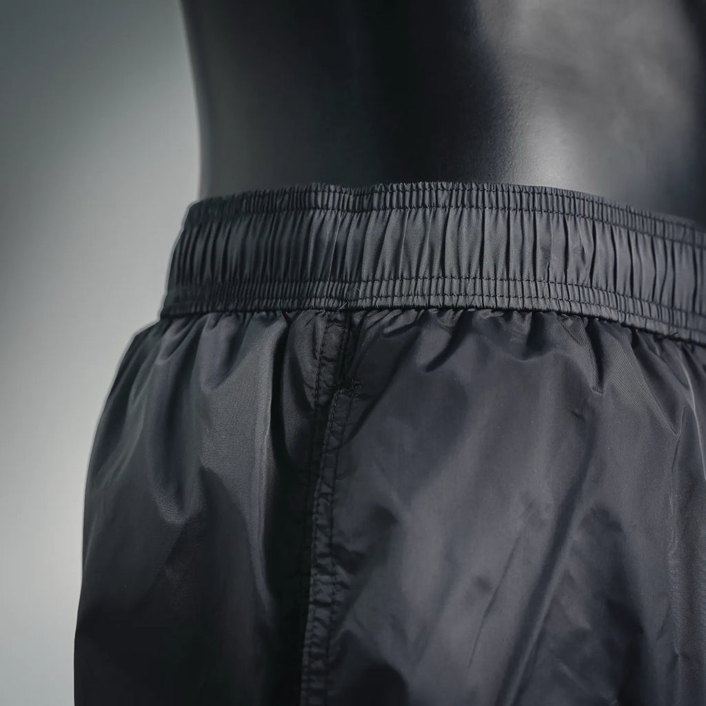 Moncler black swim shorts with textured elastic waistband and stitched front