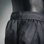 Moncler black swim shorts with textured elastic waistband and stitched front