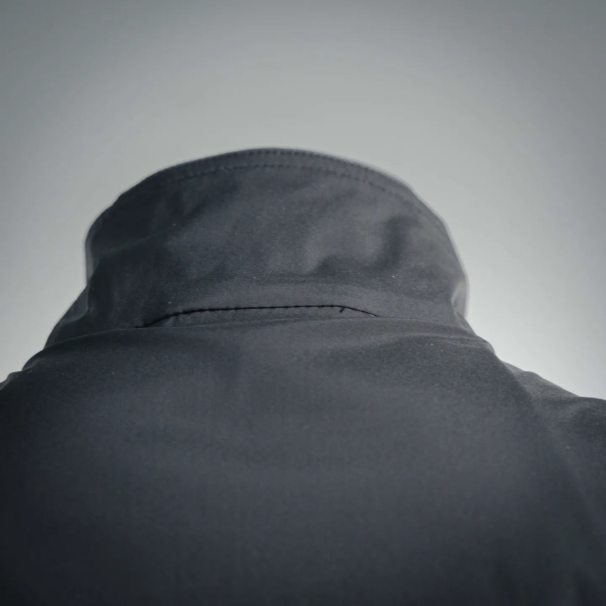 Moncler hood with curved brim on dark gilet