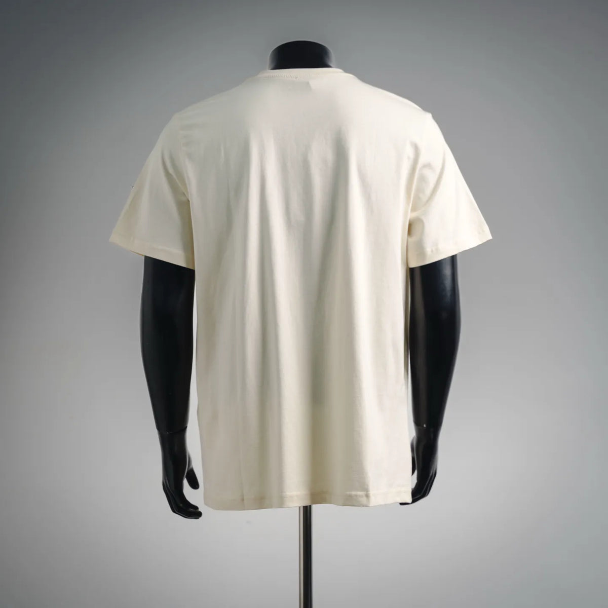 Ivory short-sleeve T-shirt on mannequin with smooth back and crew neckline