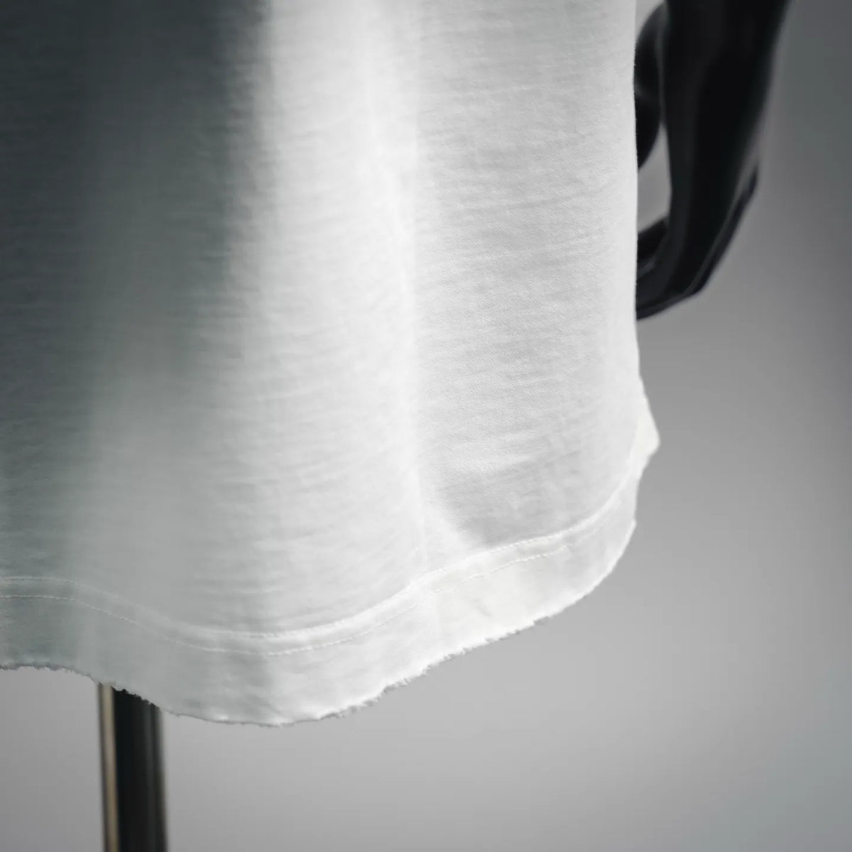White Moncler T-shirt lower hem with visible stitching