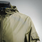 Olive green Moncler jacket collar and front zipper area with snap placket detail
