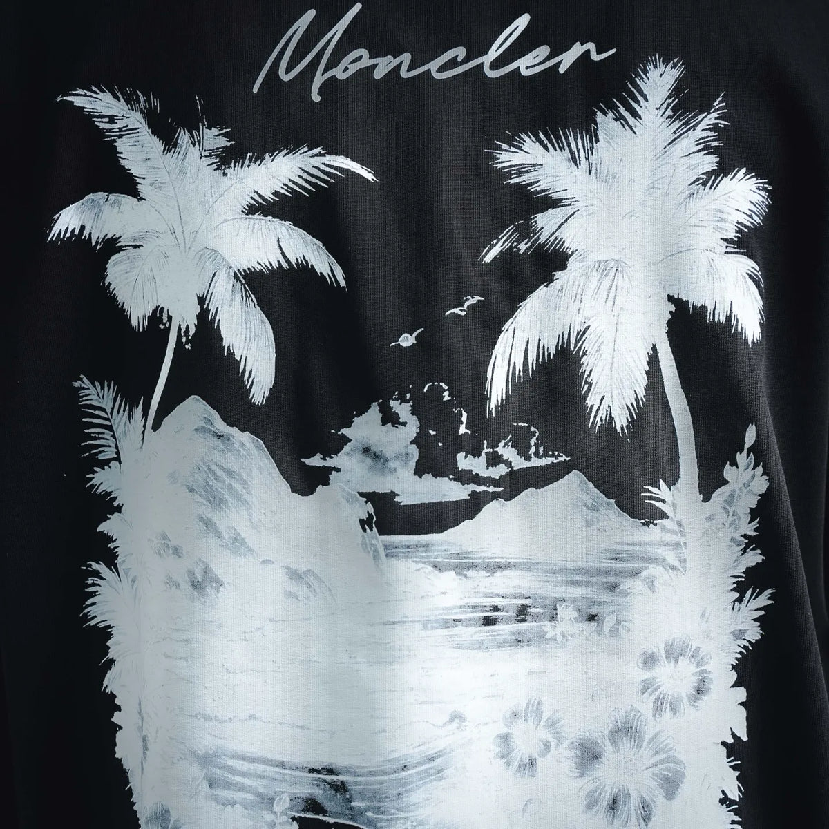 Moncler short-sleeve T-shirt front graphic close-up, palm trees and ocean scene