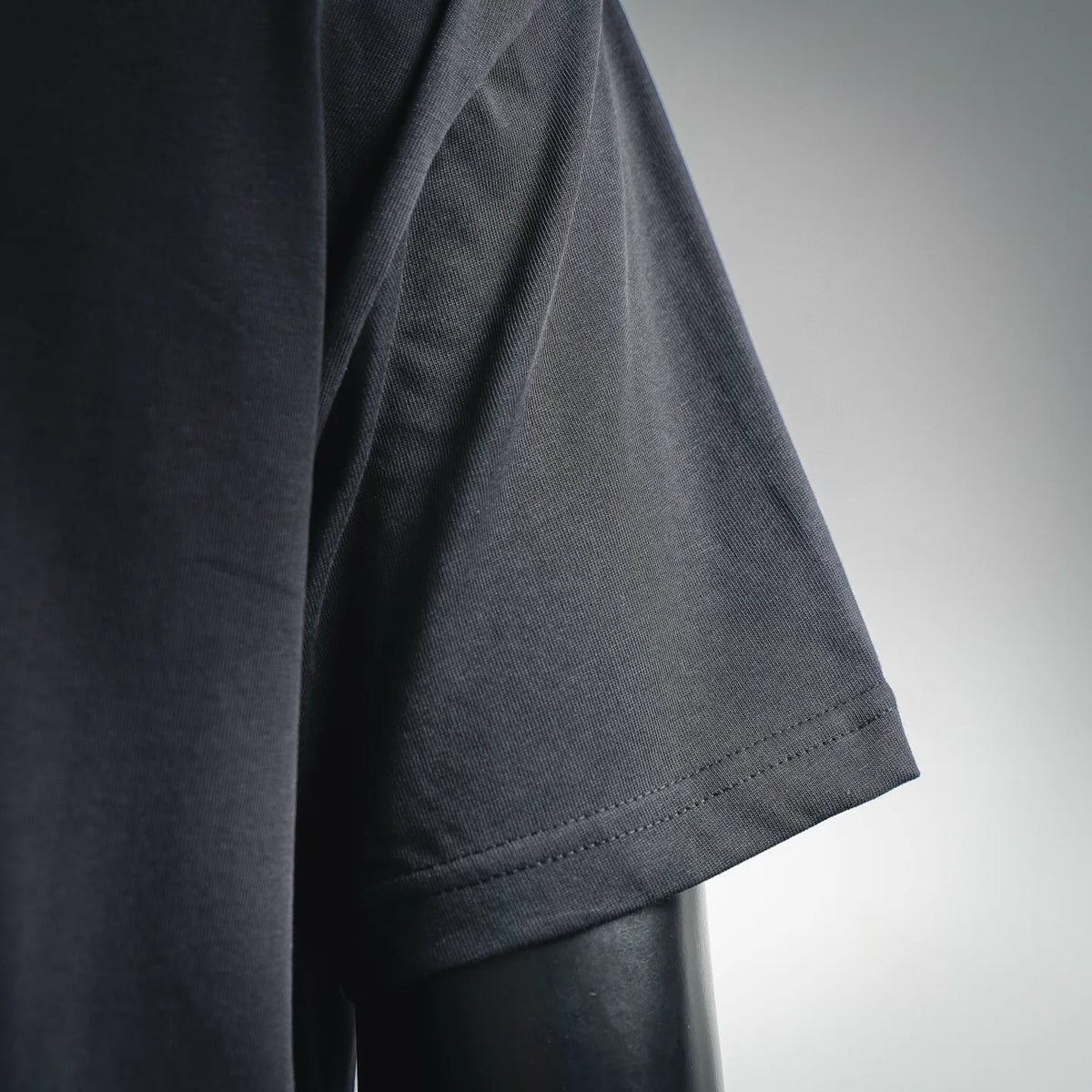 Black short-sleeve T-shirt with straight cut hem