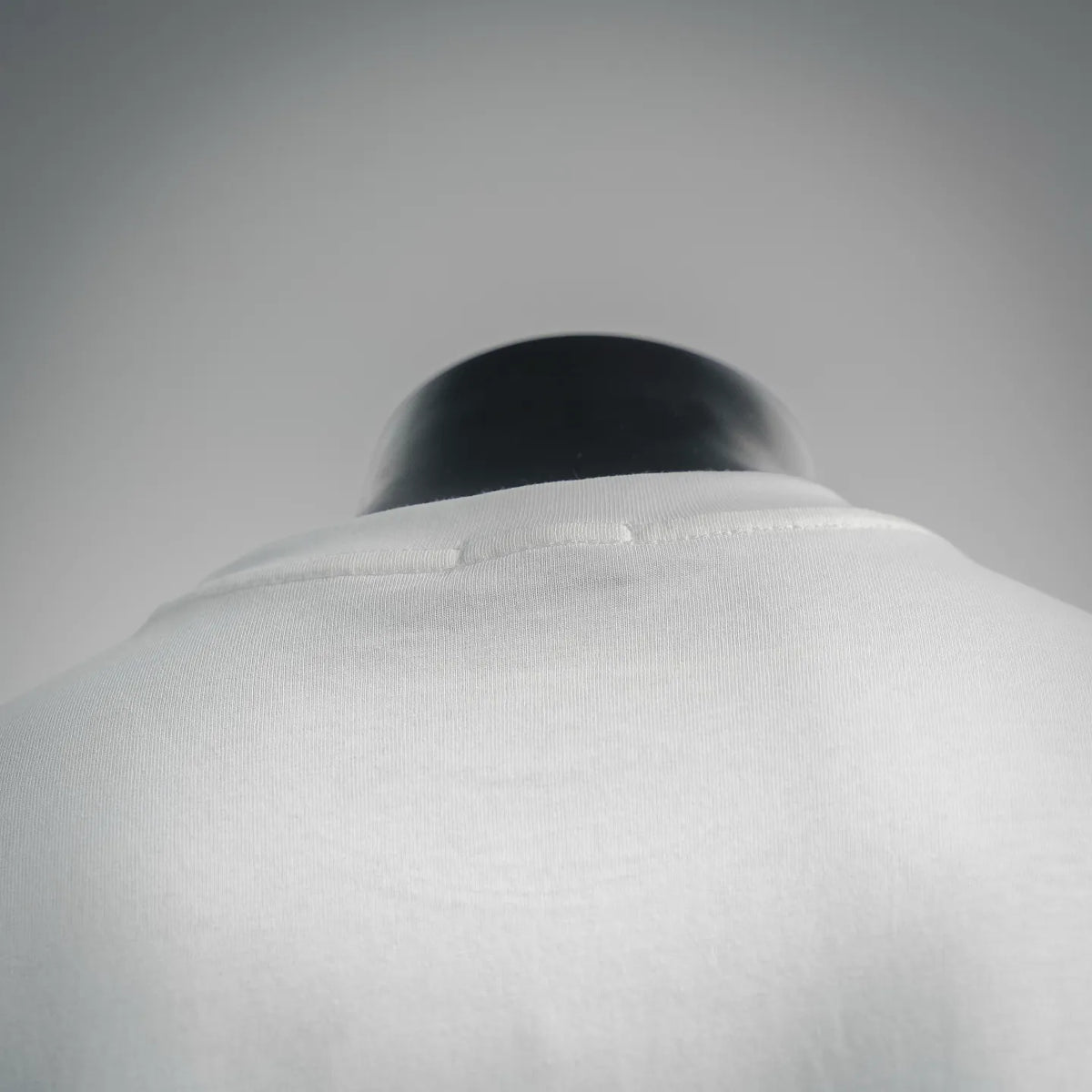White T-shirt collar and upper back on mannequin