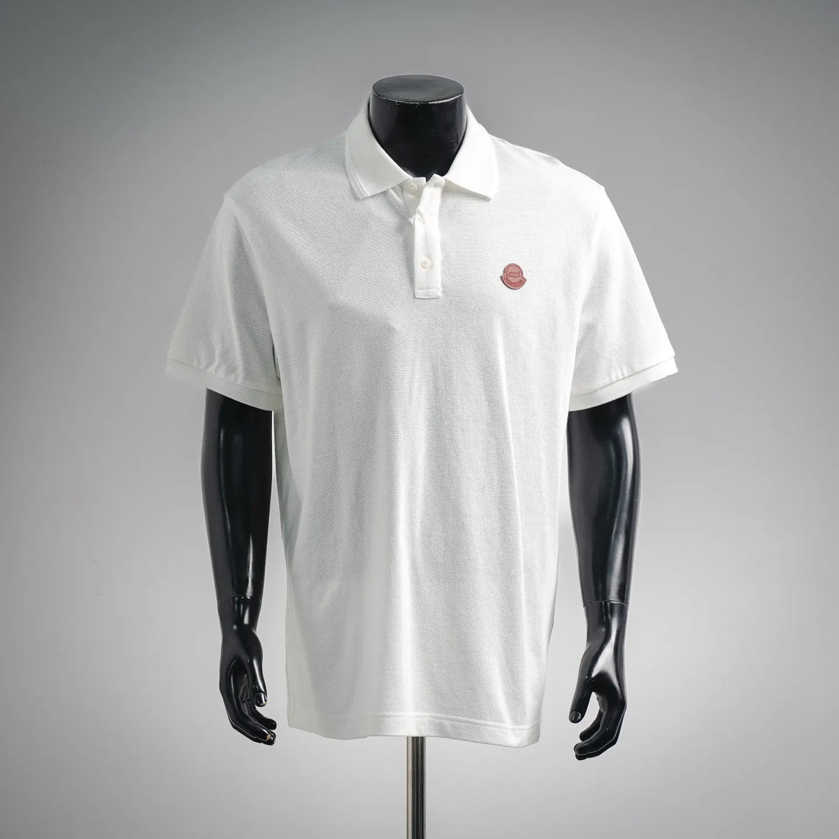 Moncler white short-sleeve polo shirt with white button placket and small chest logo