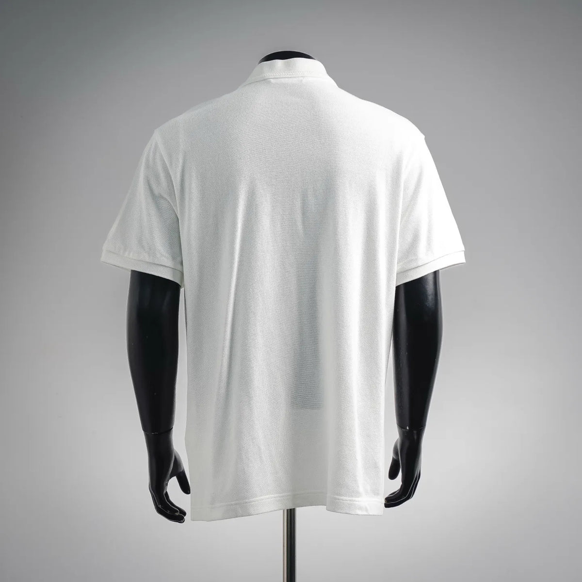 Moncler white short-sleeve polo shirt, back view with smooth round hem