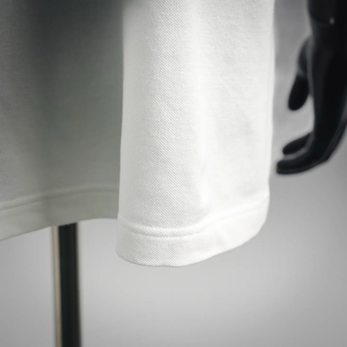 Moncler white polo shirt sleeve cuff with ribbed hem finish
