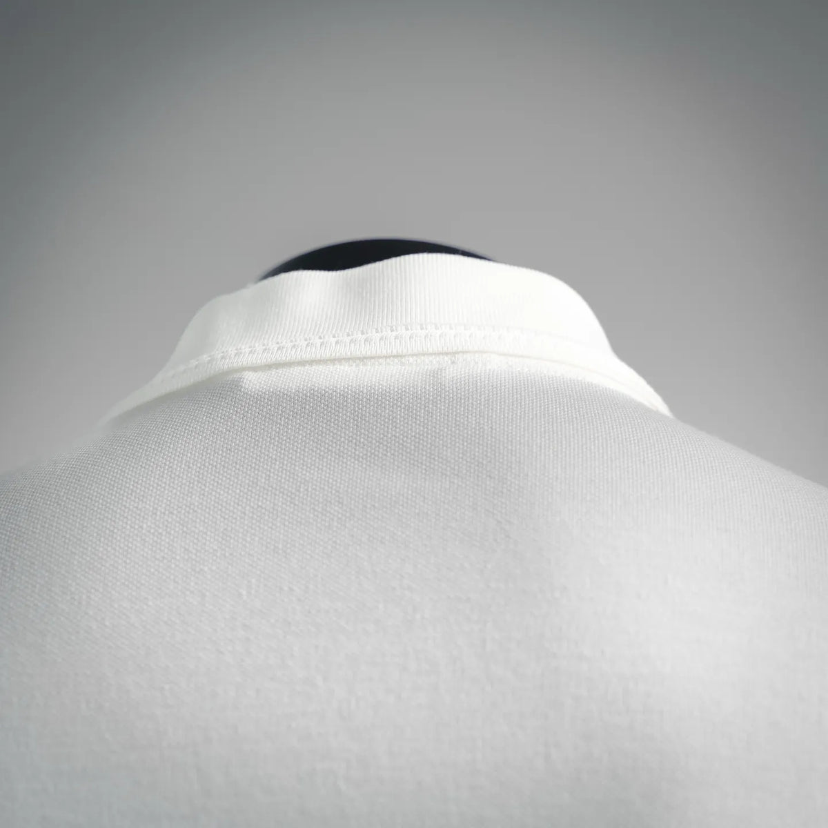 Moncler white polo shirt back collar and neckline with seam detail