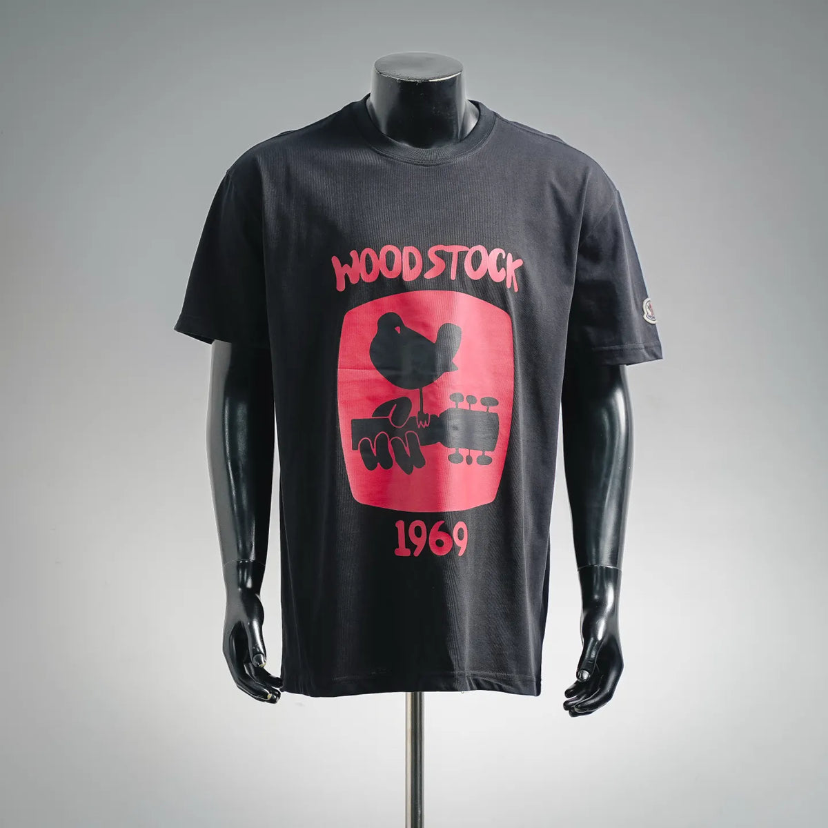 Men's black short-sleeve T-shirt with red 'WOODSTOCK 1969' graphic print