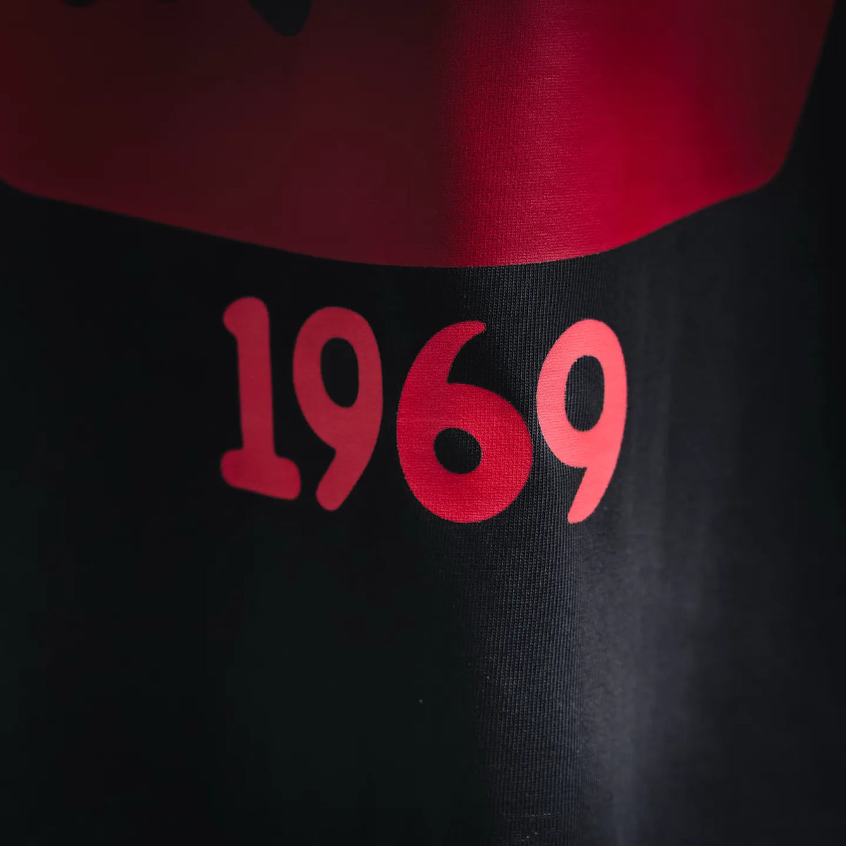Men's black T-shirt with red '1969' graphic print