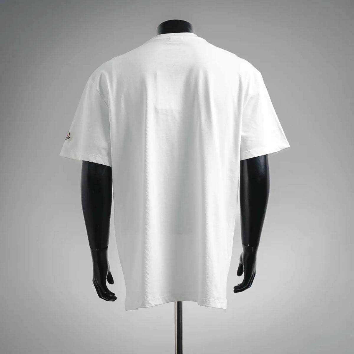 White short-sleeve T-shirt back view with smooth fabric and short sleeves