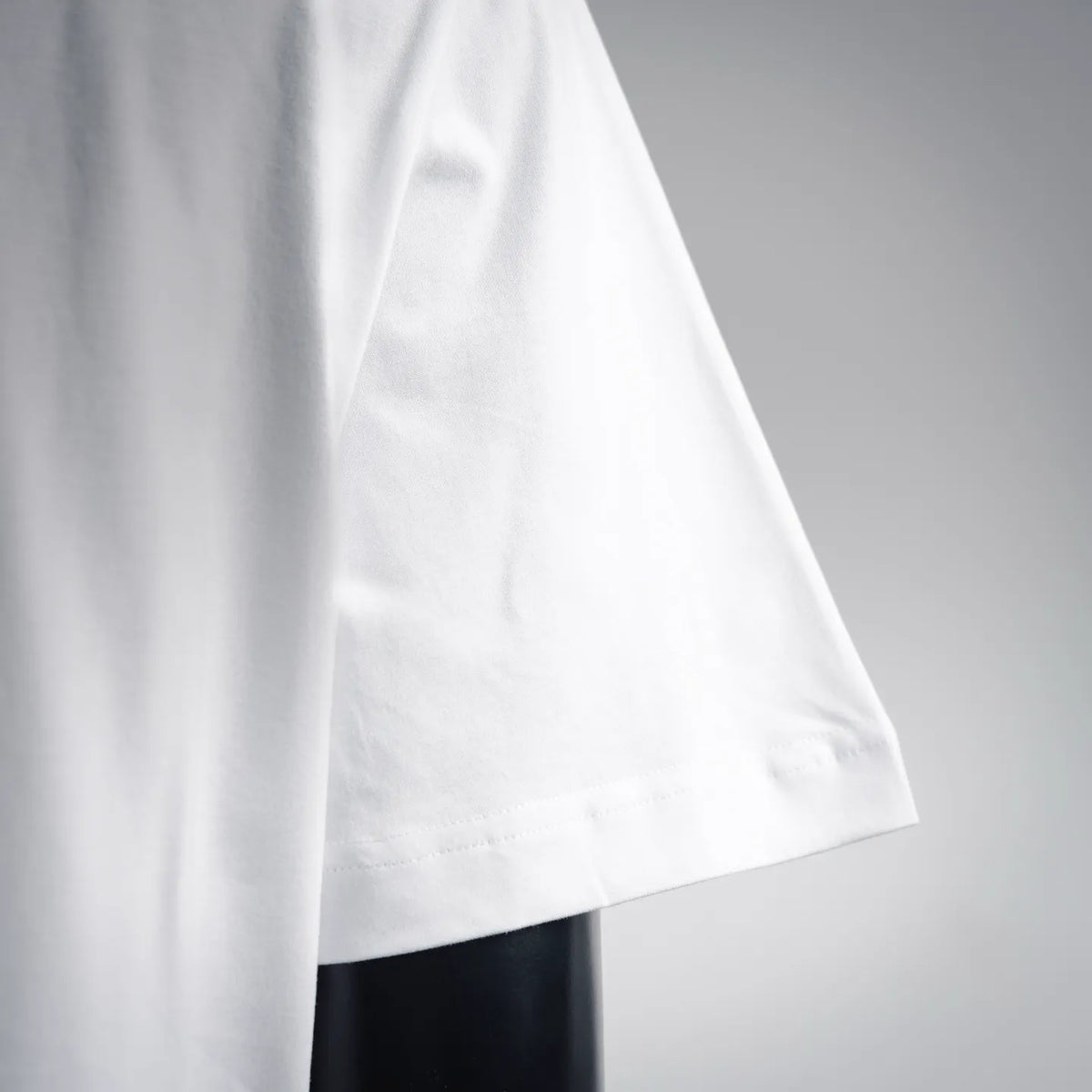 White Moncler T-shirt with straight stitched bottom hem.