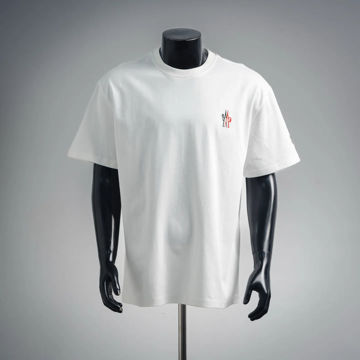 White crew-neck short-sleeve T-shirt with small chest logo