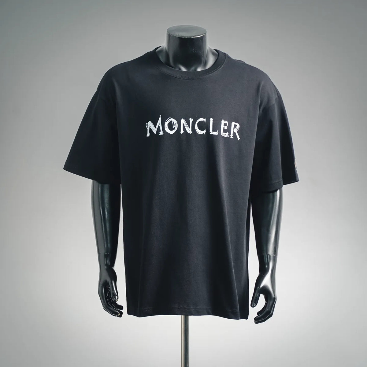 Men's dark T-shirt with MONCLER logo on front, crew neck short sleeves