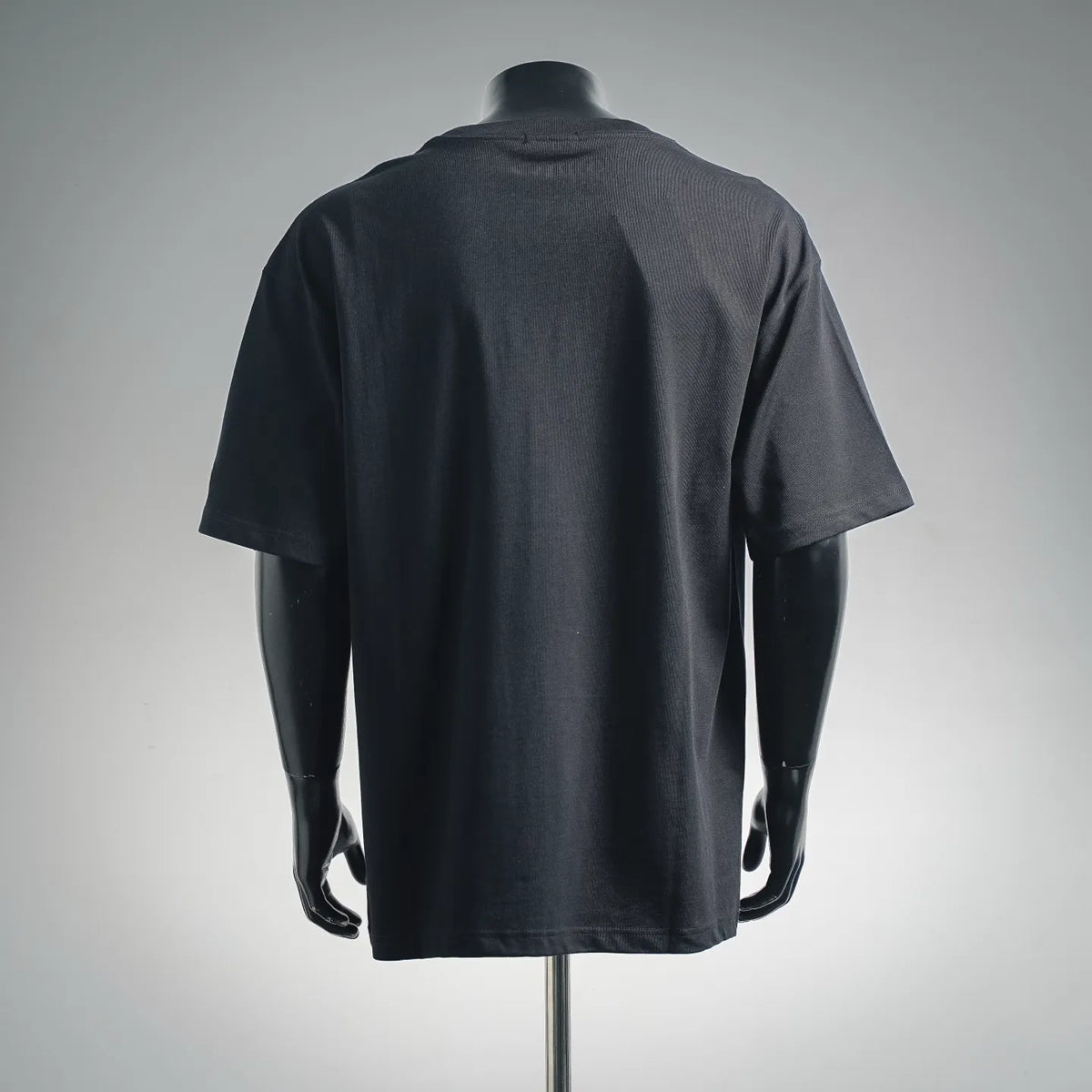 Men's dark short-sleeve T-shirt with crew neck, back view