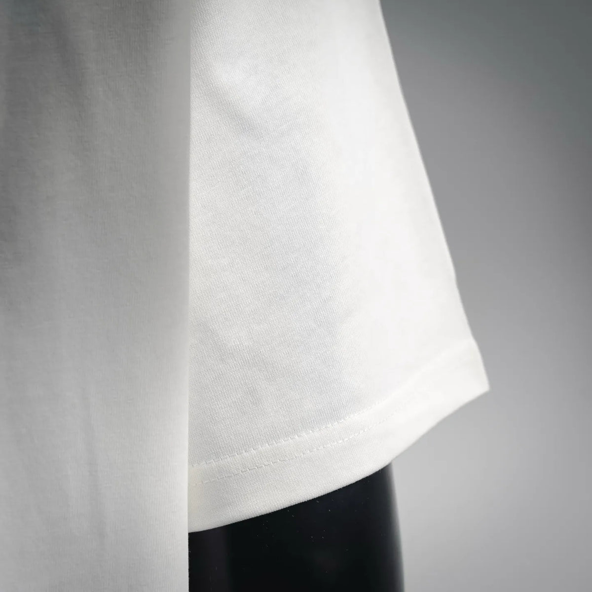 White Moncler T-shirt hem and stitching detail